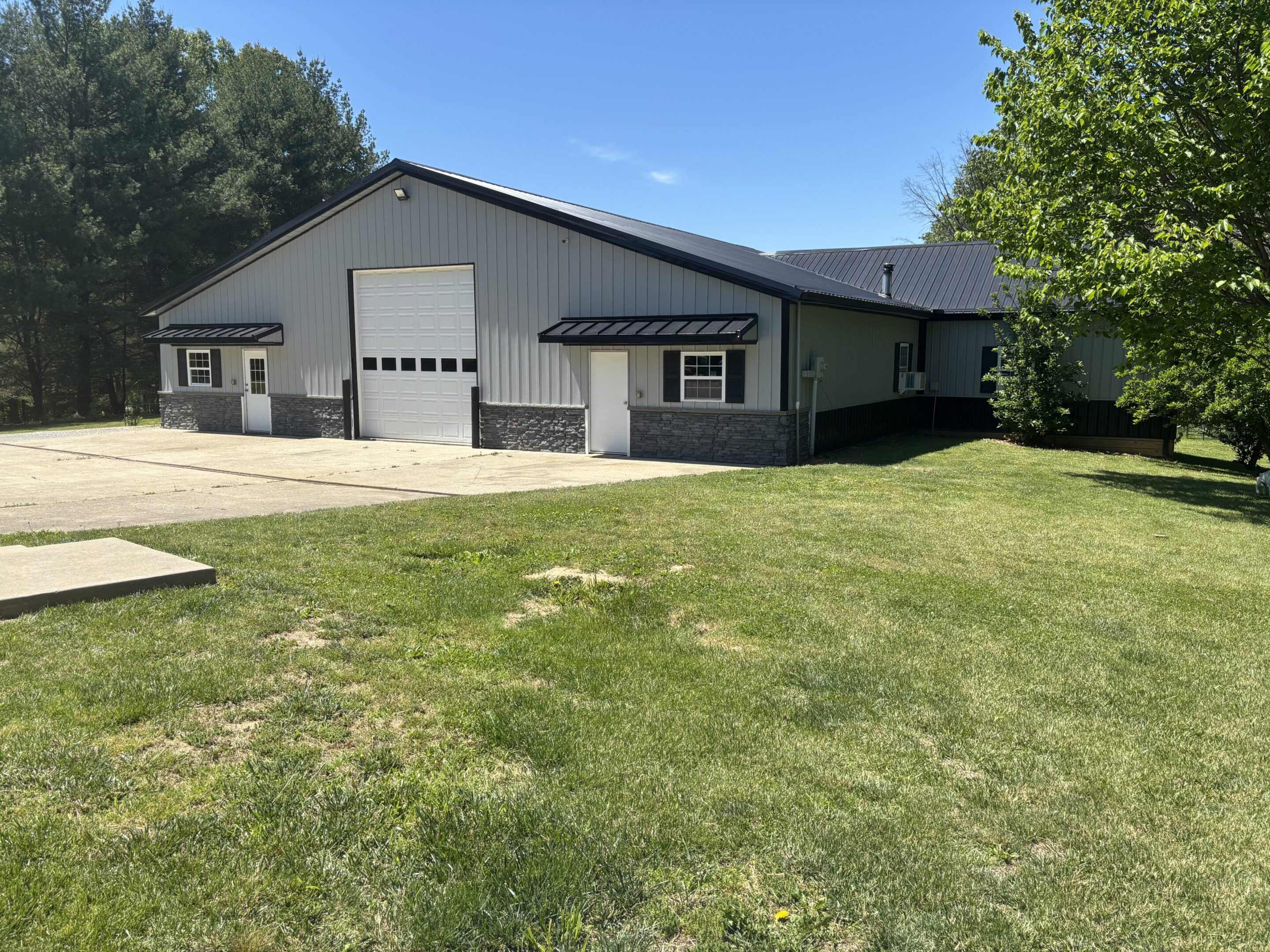Metal building with overhead garage door