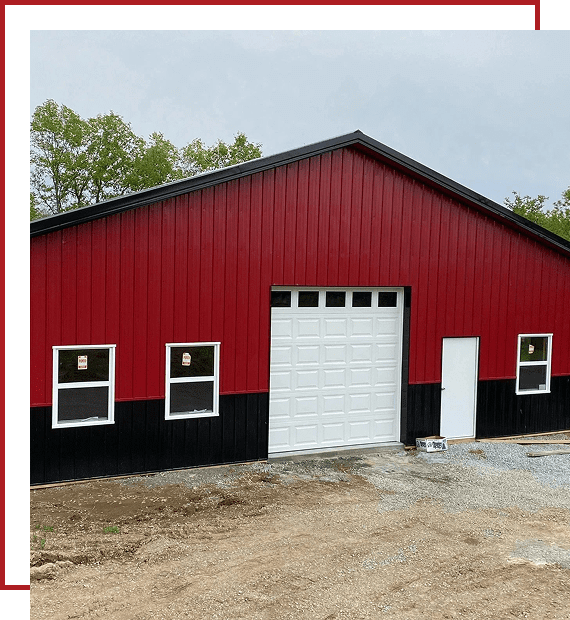 Red and black metal garage with white door